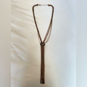 Long gold necklace